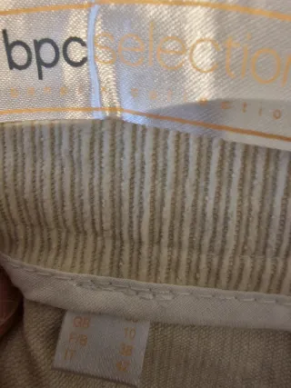 Gonna panna con cintura in tinta