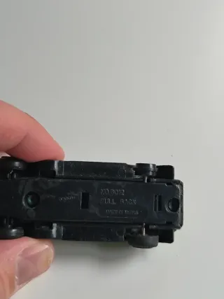 Coche a escala verde, clásico años 90