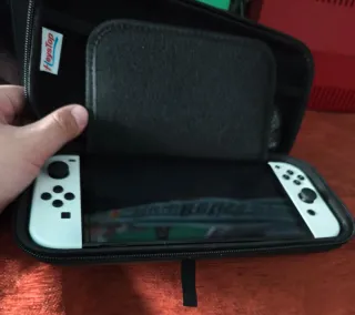 Nintendo Switch OLED + 2 Caricabatterie + FIFA 25