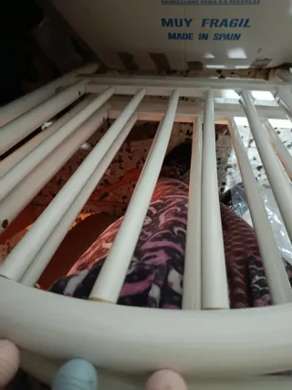 Cuna blanca con detalles