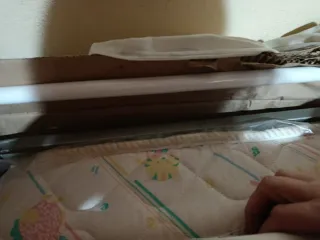 Cuna blanca con detalles