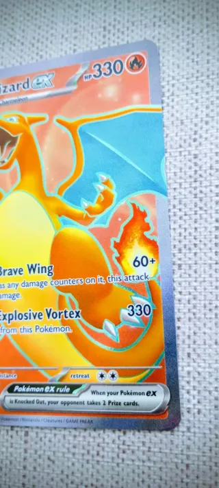 Carta Pokémon Charizard EX 183/165 año 2023