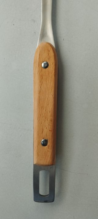 Set di utensili da cucina in legno e metallo con spatola e schiumarola