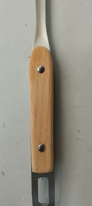 Set di utensili da cucina in legno e metallo con spatola e schiumarola