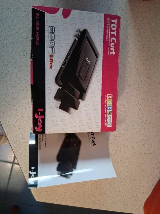 Mando TDT i-Joy con instrucciones en su caja