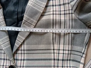 Americana blazer cuadros Uterqüe Talla L.