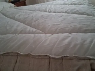 Edredón beige de tela