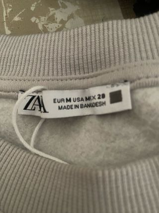 Top sin mangas Zara gris talla M