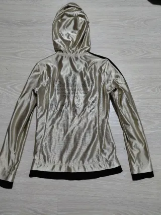 Chaqueta Adidas dorada y negra