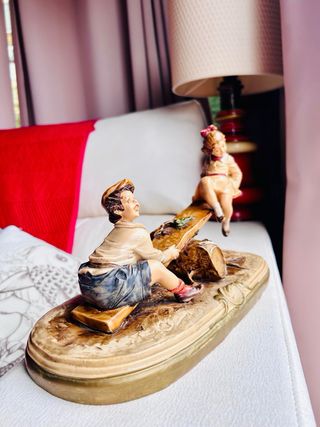 Figura porcelana italiana sube y baja SXX