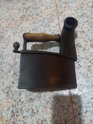 Plancha de hierro antigua