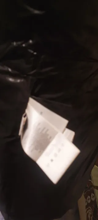 Piumino donna con cappuccio colore nero