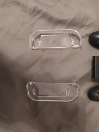 Mando Nintendo Switch + 2 fundas