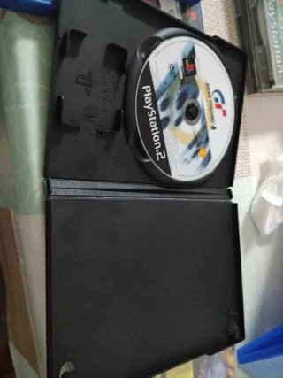 PS2 FIFA 2004, F1 2003 y Gran Turismo 4