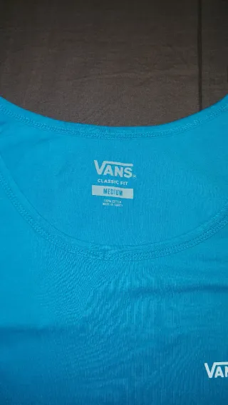 Camiseta sin mangas Vans azul y blanca