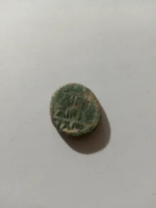 Moneda antigua de bronce