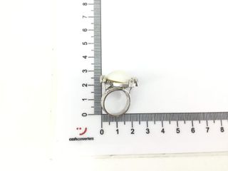 anillo oro 18k con piedra con diamante,perla