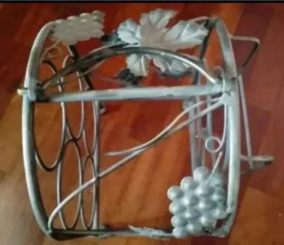 Porta bottiglie in ferro battuto