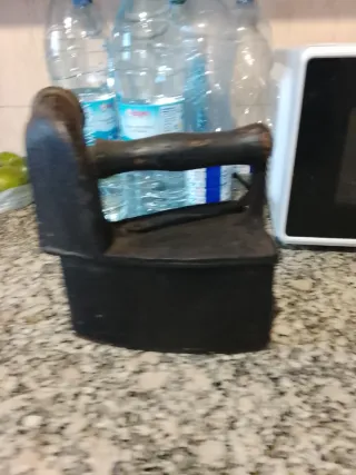 Plancha de carbón antigua