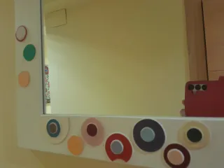 Espejo de pared decorado