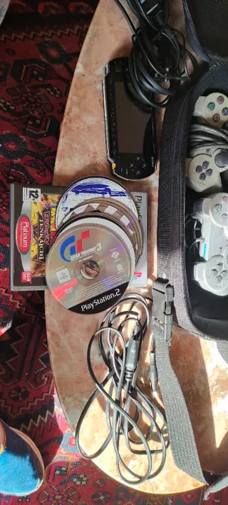 PlayStation 2 con giochi e accessori + PSP