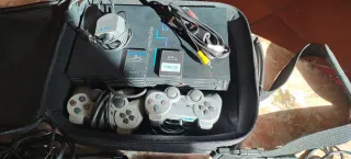 PlayStation 2 con giochi e accessori + PSP