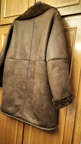 Abrigo piel vuelta con borreguito
