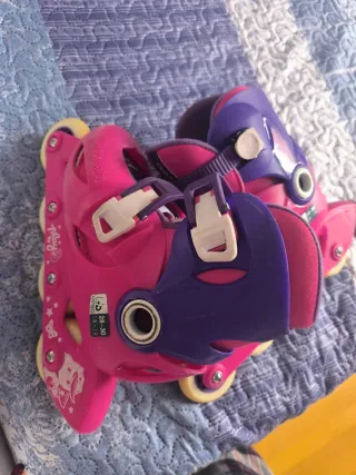 Patines en línea rosas y morados para niña