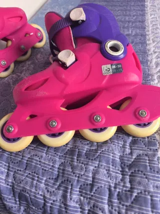 Patines en línea rosas y morados para niña