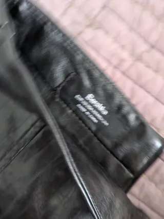 Falda negra cuero sintético con hebilla