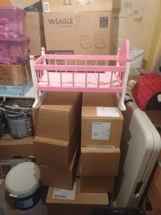 Cuna de juguete rosa