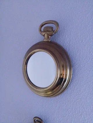 Specchi decorativi in stile orologio tascabile