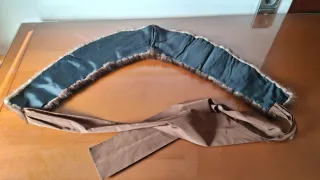 2 cuellos de piel marrones y negros