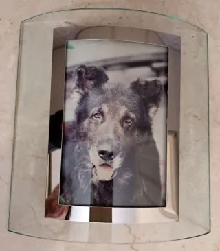 Cornice ovale in vetro e metallo