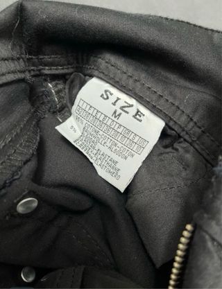Pantalones negros con cinturón ancho