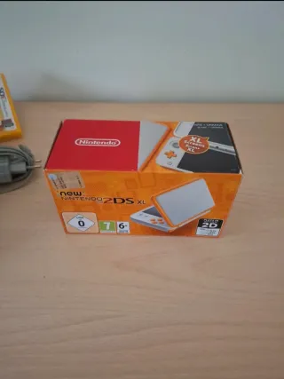 Nintendo 2DS XL + due giochi + carrying case