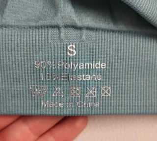 Top deportivo cruzado color verde azulado