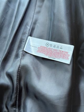 Chaleco polipiel negro con capucha Primark