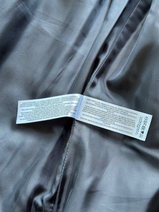 Chaleco polipiel negro con capucha Primark