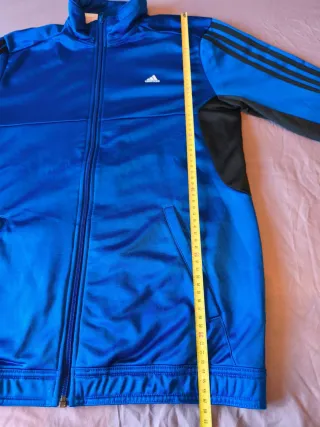 Chaqueta deportiva Adidas azul y negra Sólo envío