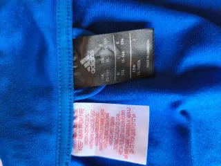 Chaqueta deportiva Adidas azul y negra Sólo envío