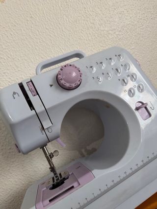 Máquina de coser portátil