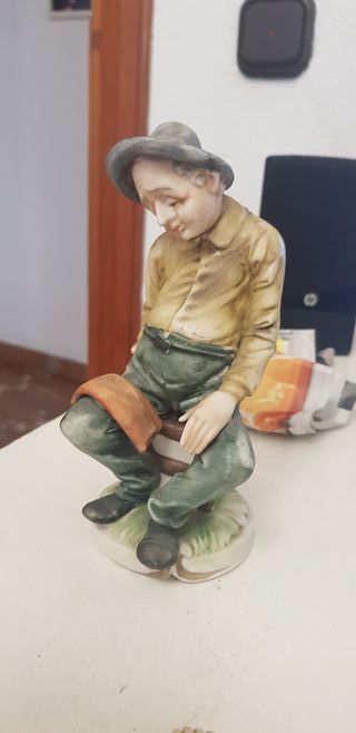 Figuras de porcelana imagenes sentadas