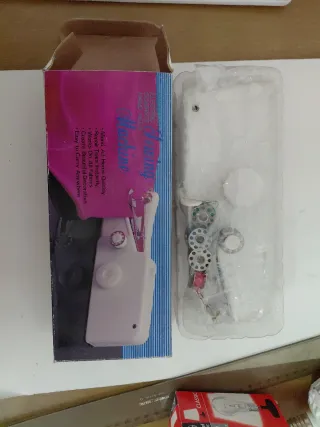 Máquina de coser eléctrica portátil