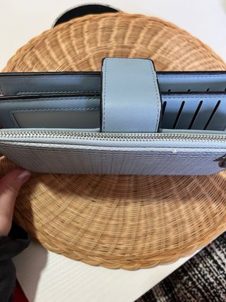 Monedero azul y gris