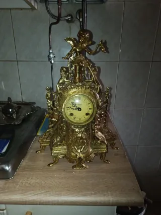 Reloj de cuerda antiguo dorado