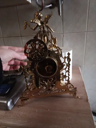 Reloj de cuerda antiguo dorado