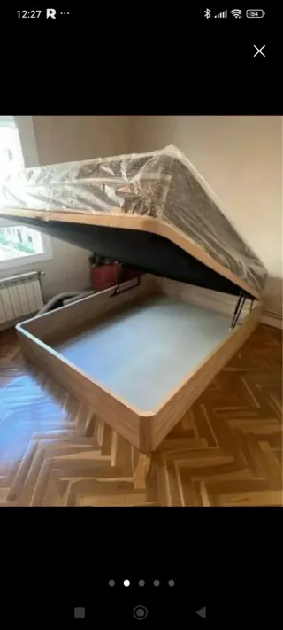 Canapé cama blanco con cabecero