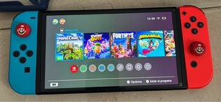 Pack Nintendo Switch OLED  con accesorios y seguro