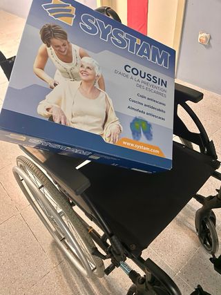 Silla ruedas plegable de acero + cojin antiescaras